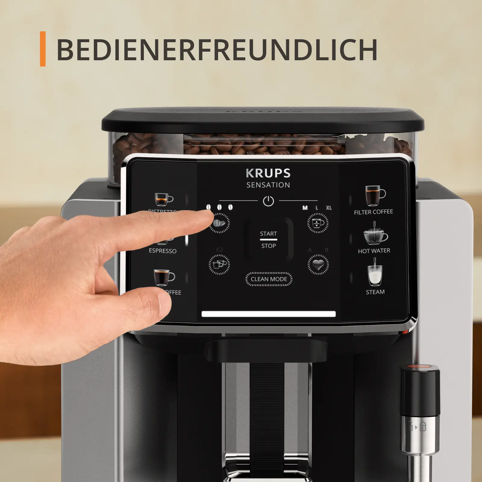 Die Hand einer Person berührt das Bedienfeld einer Krups Kaffeemaschine.