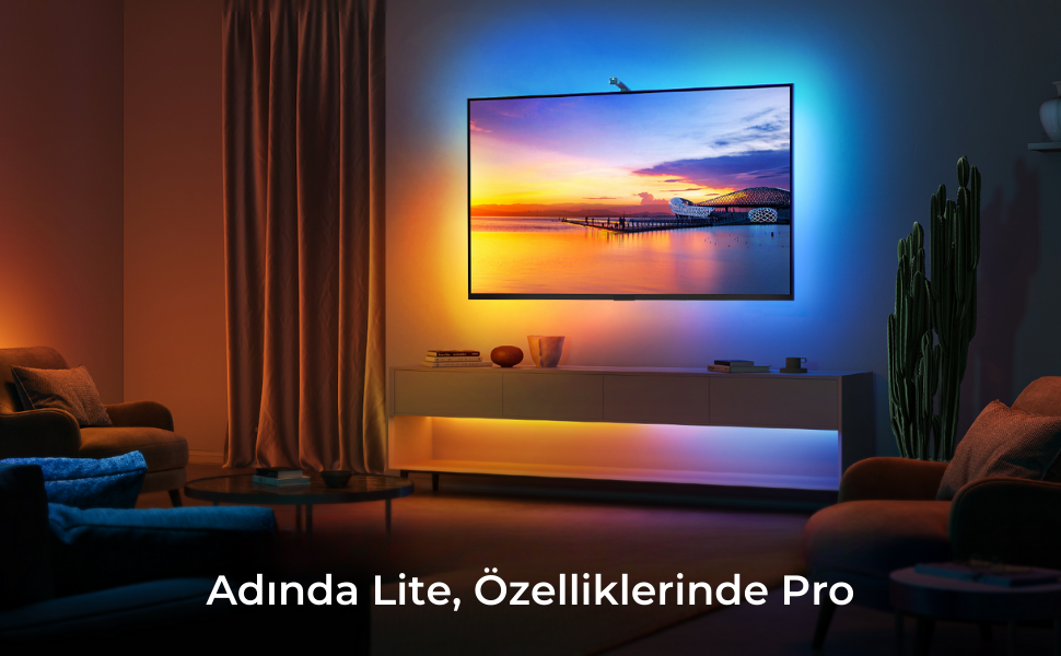 TV'li oturma odası. TV'de gün batımı görüntüsü ve etrafında LED ışık var.