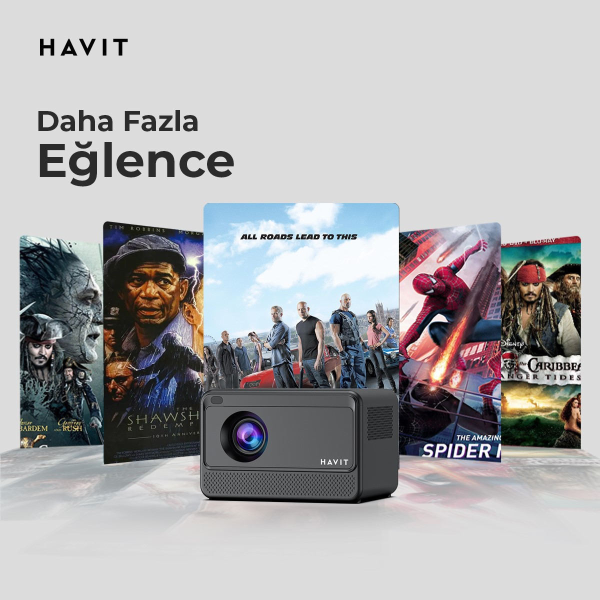 Bir projektör ve beş film afişi. Metin 'Daha Fazla Eğlence' ve 'HAVIT' diyor.
