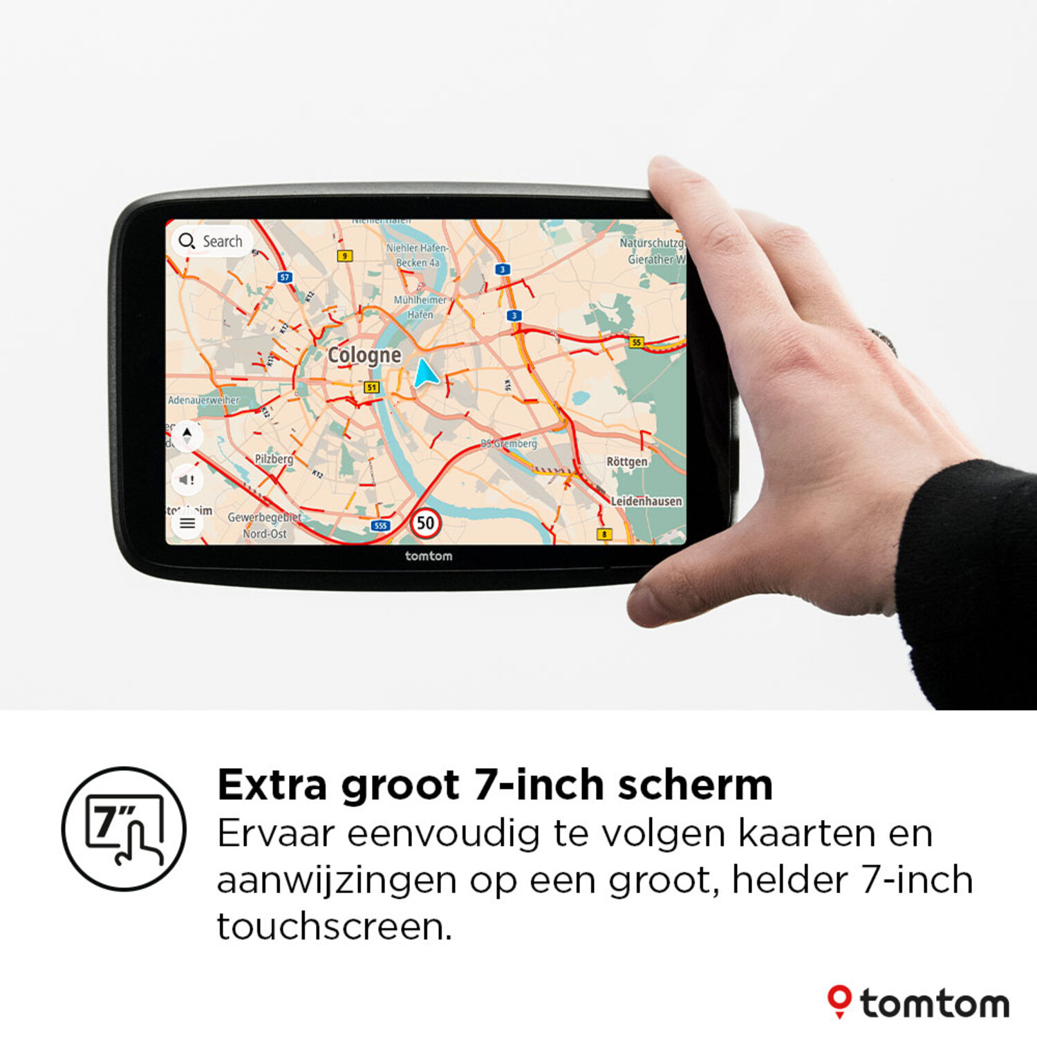 A hand holding a tablet showing a map of Cologne, Germany, with a navigation prompt.