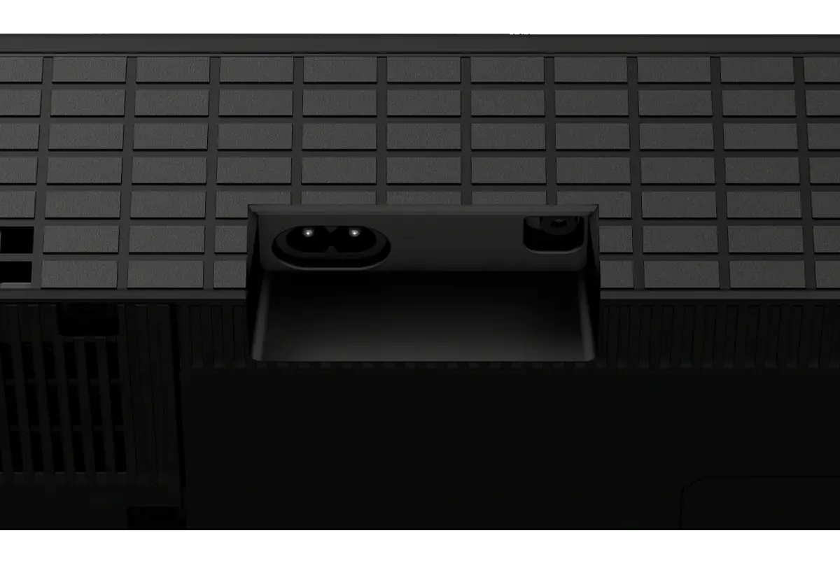 Czarny tylny panel urządzenia z wejściem zasilania.