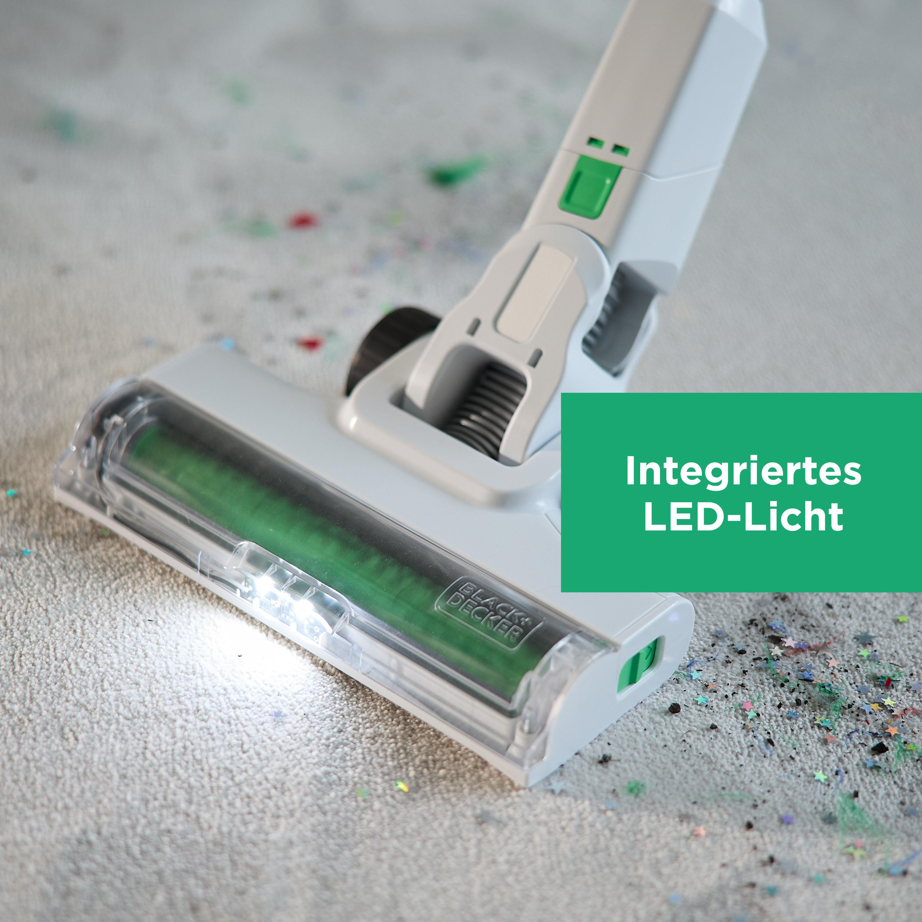 Staubsaugerkopf mit LED-Licht, reinigt Teppich mit Glitzer.