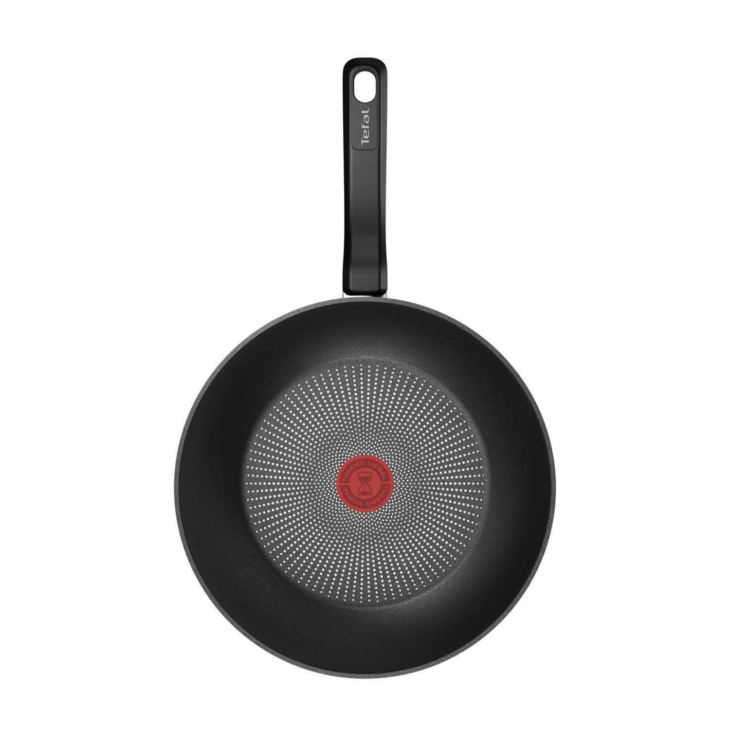 A black frying pan with a long handle, top view, on a white surface.