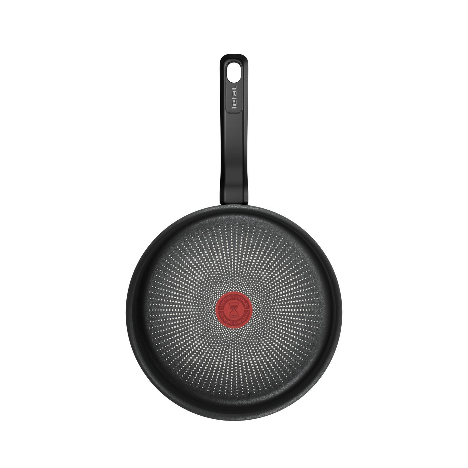 Black frying pan with a red dot in the middle. Isolated on white background.