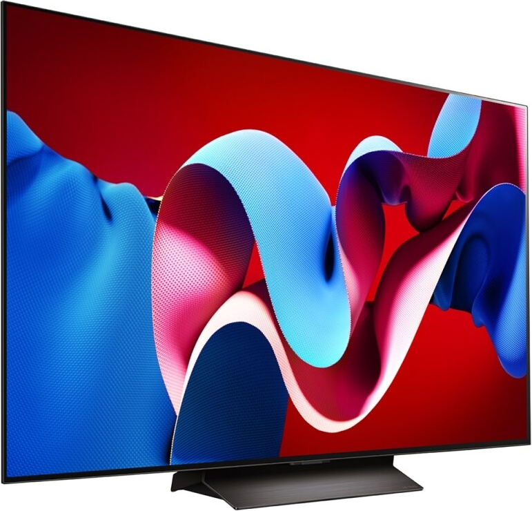 Un grand écran de télévision affichant un design abstrait coloré avec du rouge, du bleu et du blanc.