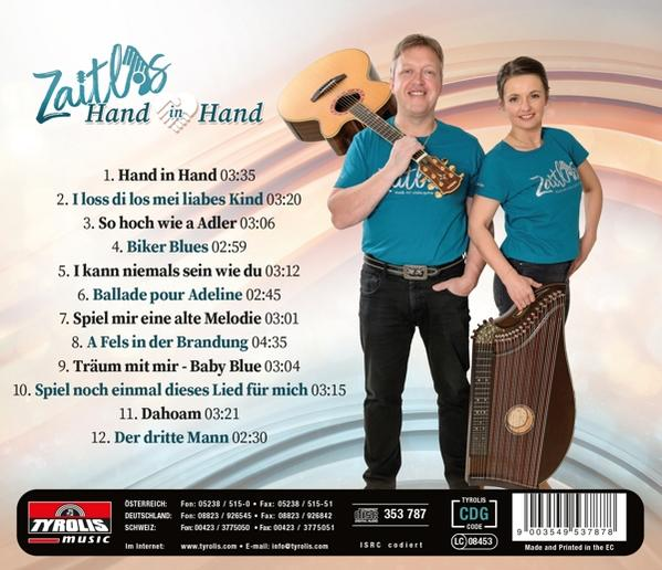 Duo mit Gitarre und Zither auf CD-Cover. Liederliste im Hintergrund.