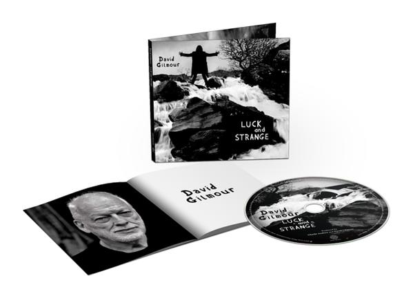 David Gilmours Albumcover, mit einer CD und einem geöffneten Booklet.