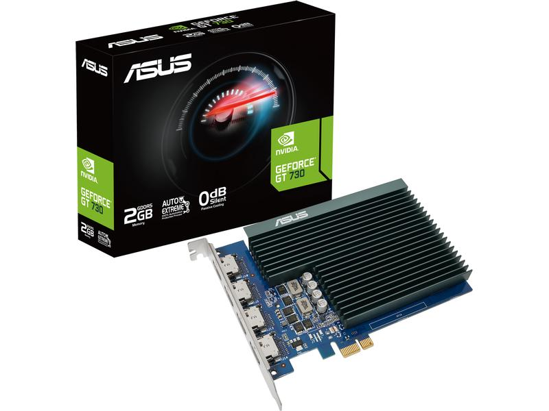 Une carte graphique ASUS GeForce GT 730 et sa boîte sont affichées. La carte a un dissipateur thermique et se trouve à côté de sa boîte.