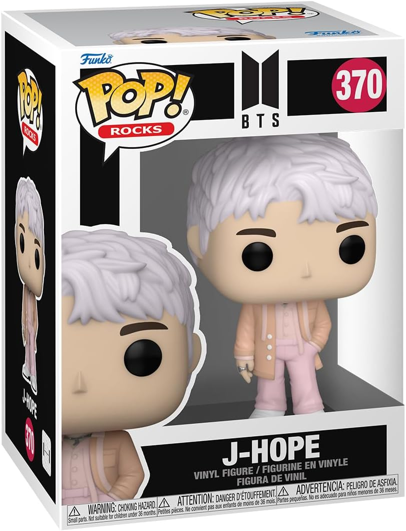 Egy Funko Pop figura J-Hope-ról a BTS-ből, dobozban. A figura rózsaszín ruhát visel fehér hajjal.