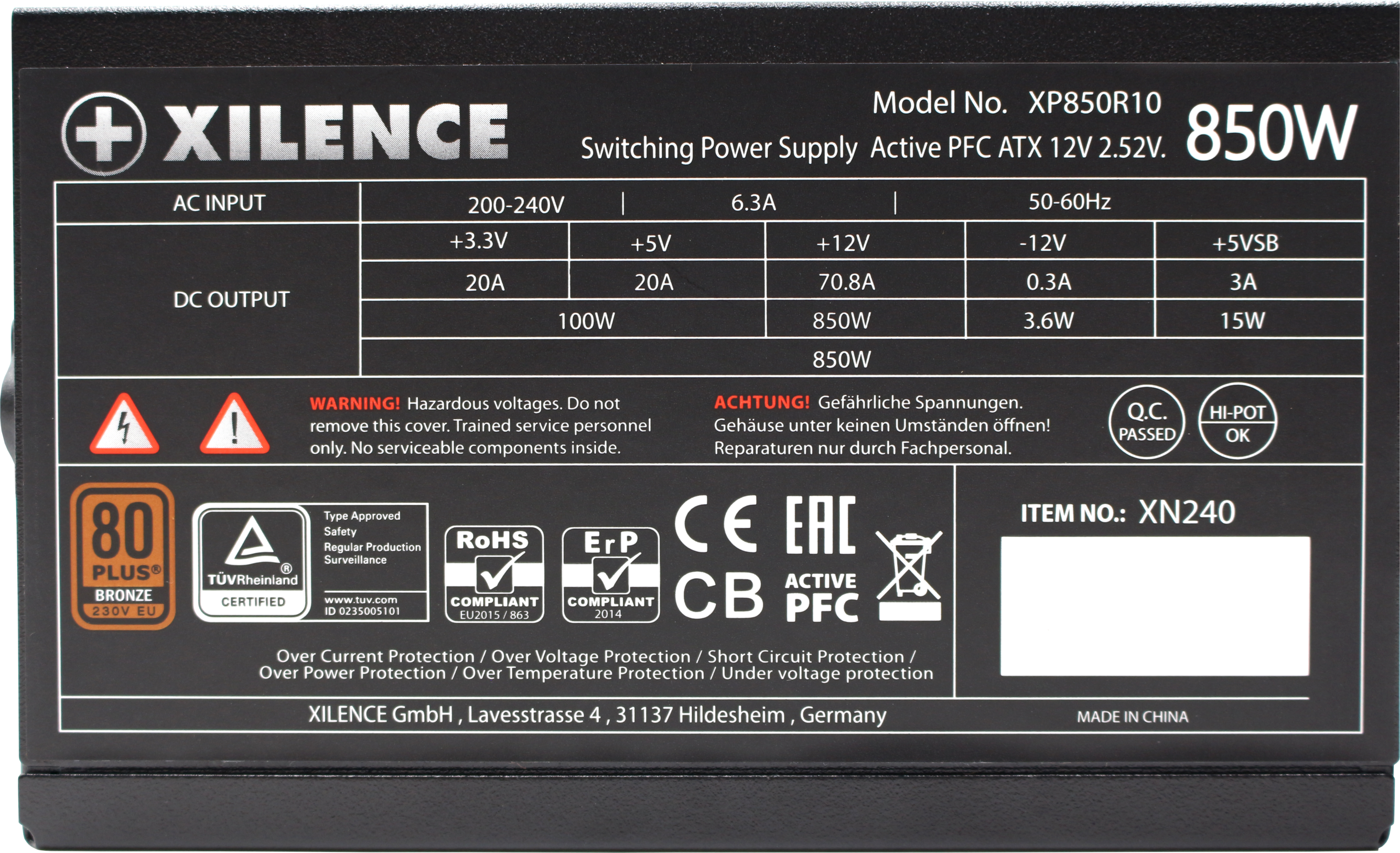 Un alimentatore Xilence 850W, nero, con etichette e avvertenze.