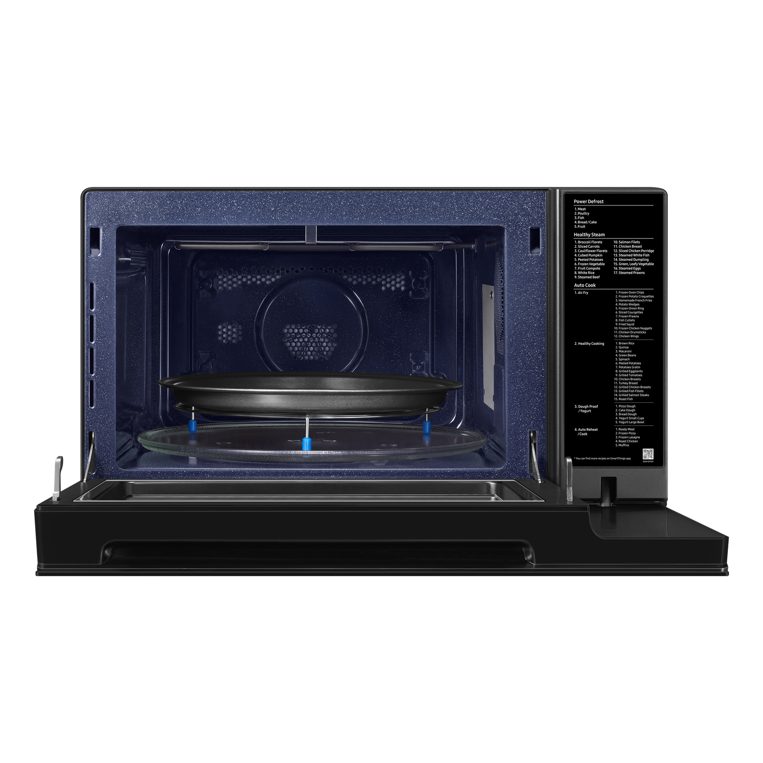 Microwave interior view with glass plate, black interior, open door. White background.