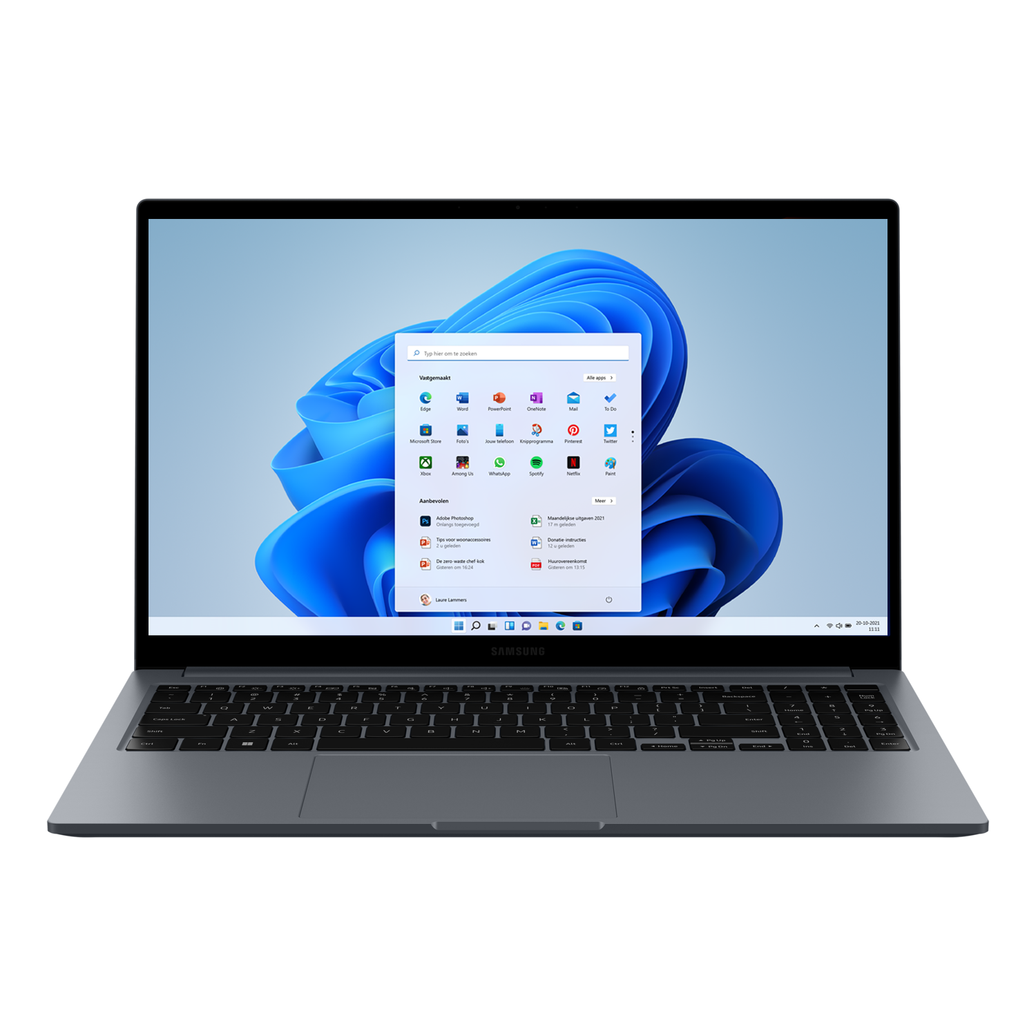 Ordinateur portable, gris, ouvert, bureau Windows visible, avec diverses icônes d'applications.