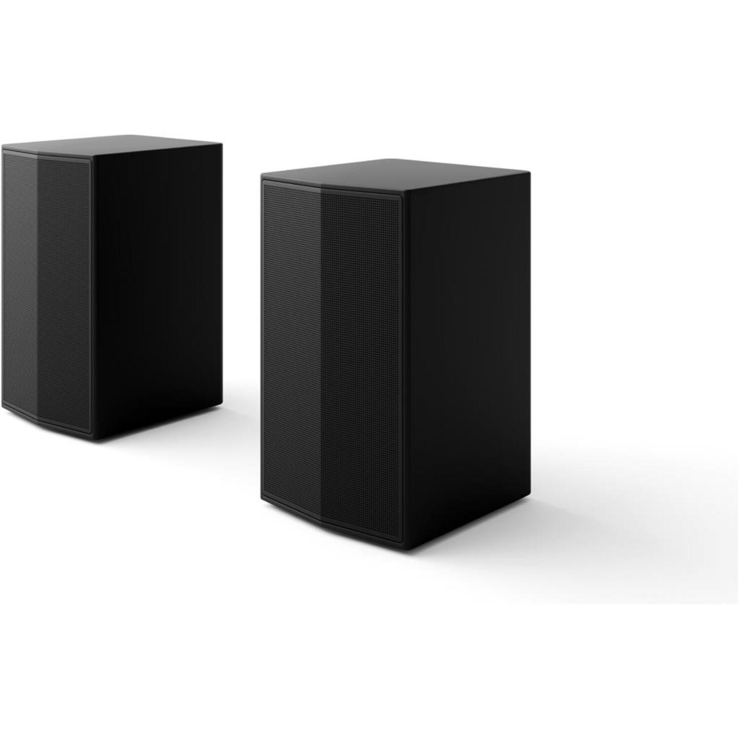 Deux enceintes noires. Design simple. Fond blanc. Ombre sur le côté droit.