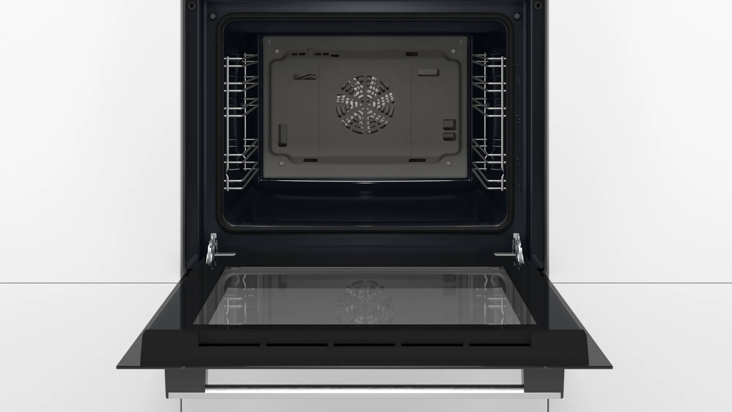 Oven with open door, showing interior details, the fan and the racks.