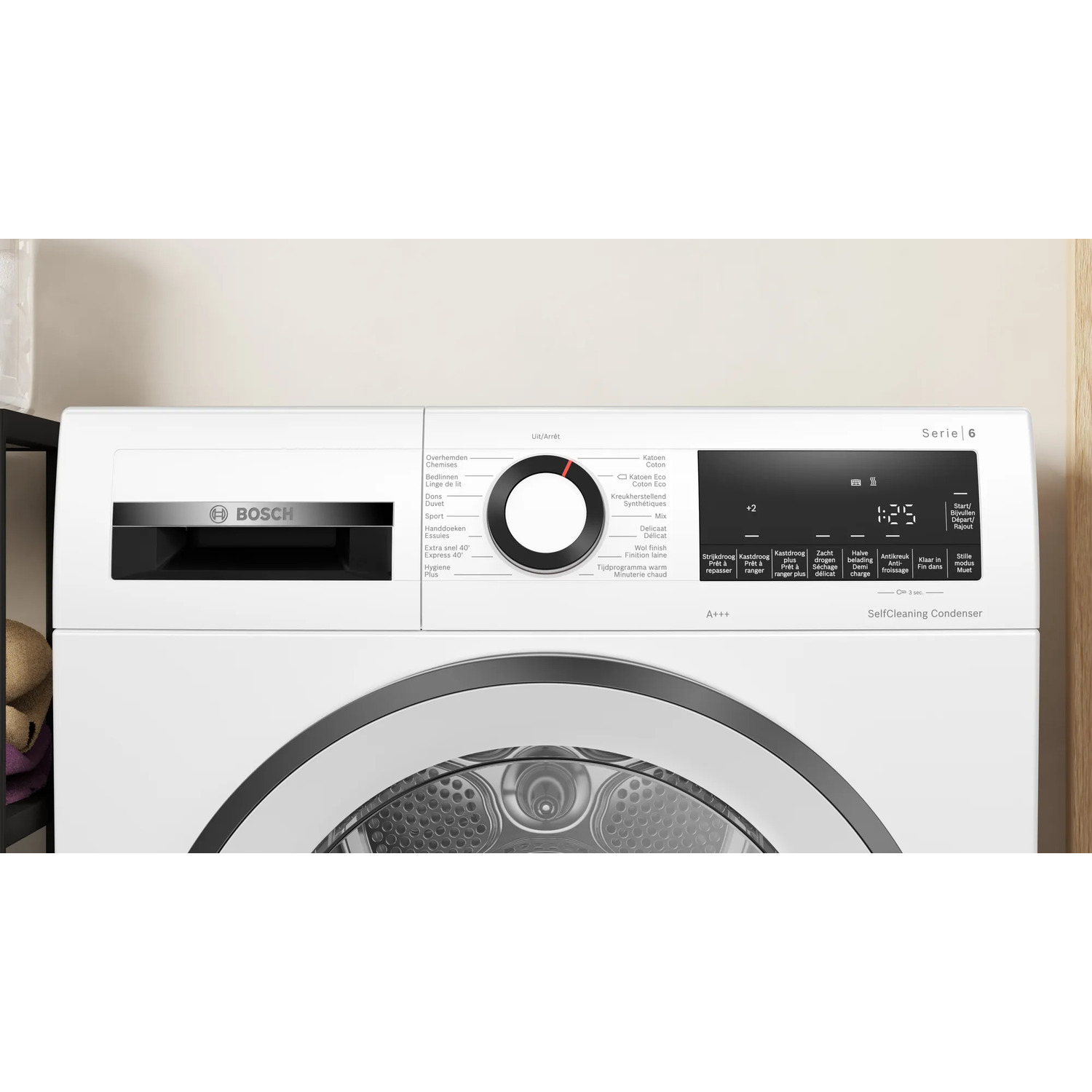 White washing machine with controls. Display, dial, and buttons are visible.