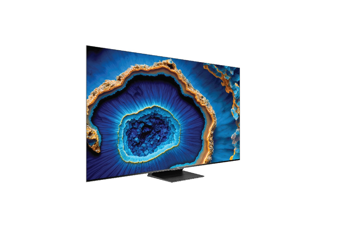 Ekranda mavi ve altın soyut tasarımlı büyük, kavisli bir TV.
