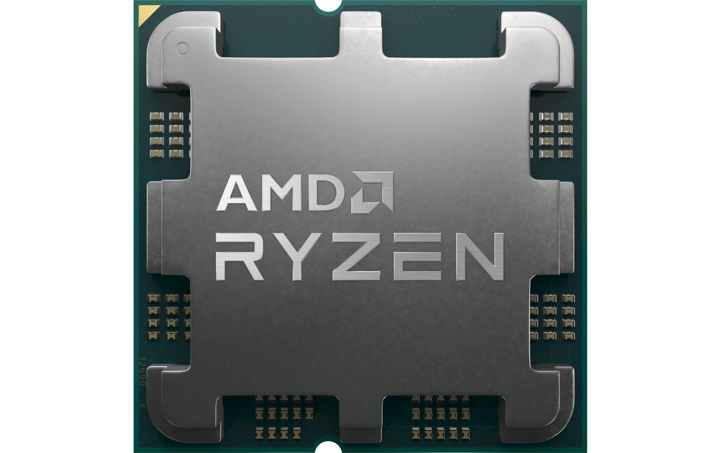 Nahaufnahme einer CPU. Es hat eine silberne Metalloberseite mit dem AMD Ryzen-Logo. Die Basis ist grün mit goldenen Pins.