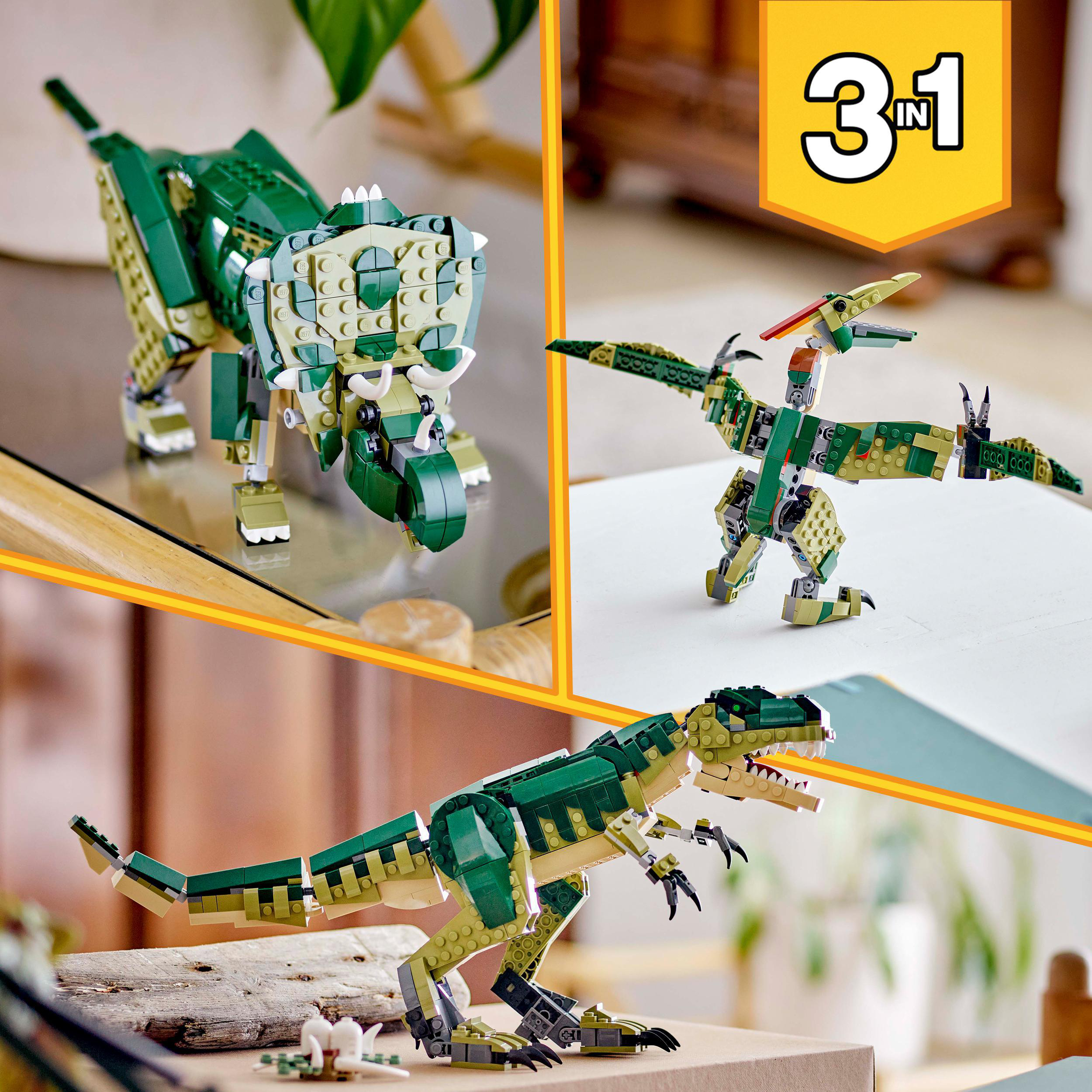 Ein Lego-Set mit grünen Triceratops-, Pterodactylus- und Tyrannosaurus Rex-Figuren auf einem Tisch.