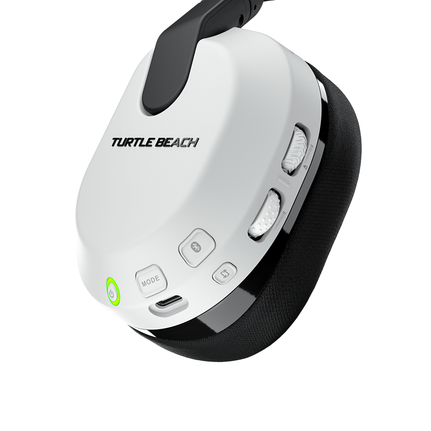 Casque de jeu blanc et noir avec boutons de commande. Texte sur le casque : 'TURTLE BEACH'.