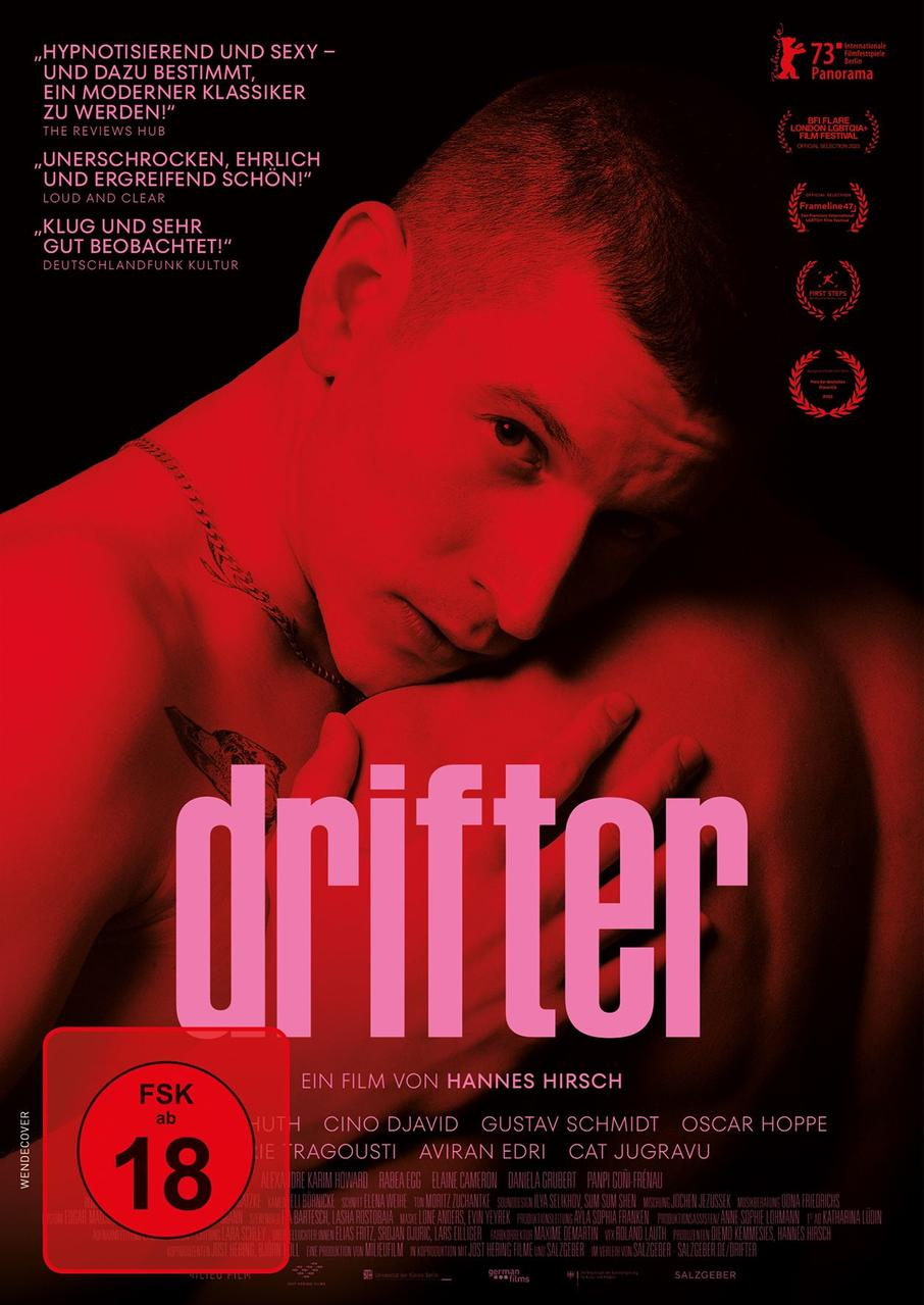 Filmposter für 'Drifter', mit einem Männergesicht in Rot- und Pinktönen.