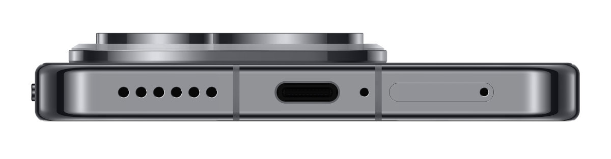 Zbliżenie dolnej krawędzi smartfona. Posiada port USB-C i inne funkcje.