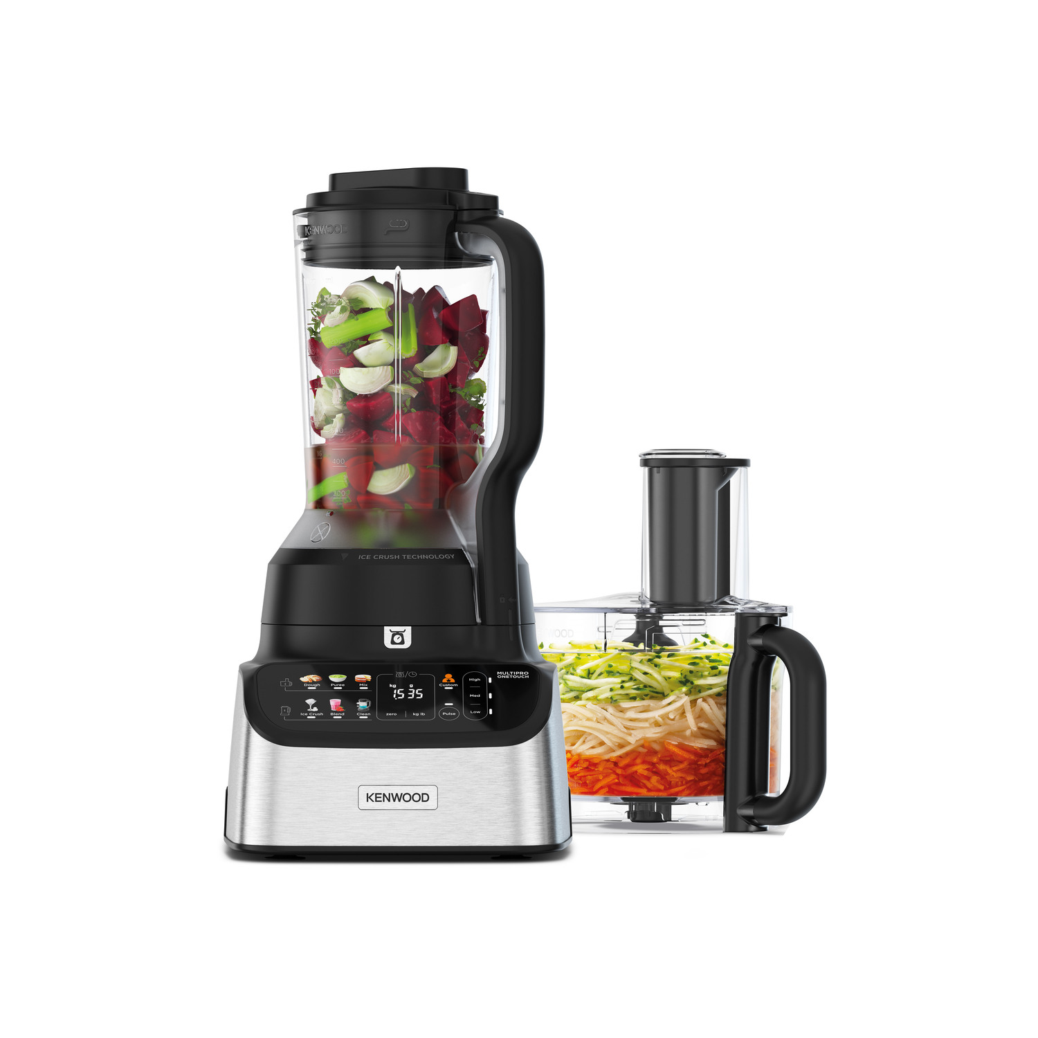 A blender with vegetables inside, and a food processor attachment.