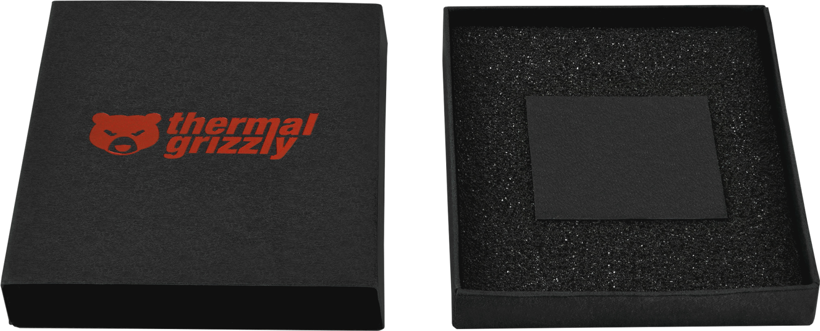 Geöffnete schwarze Thermal Grizzly Box mit Logo, mit einem kleinen schwarzen Quadrat darin.