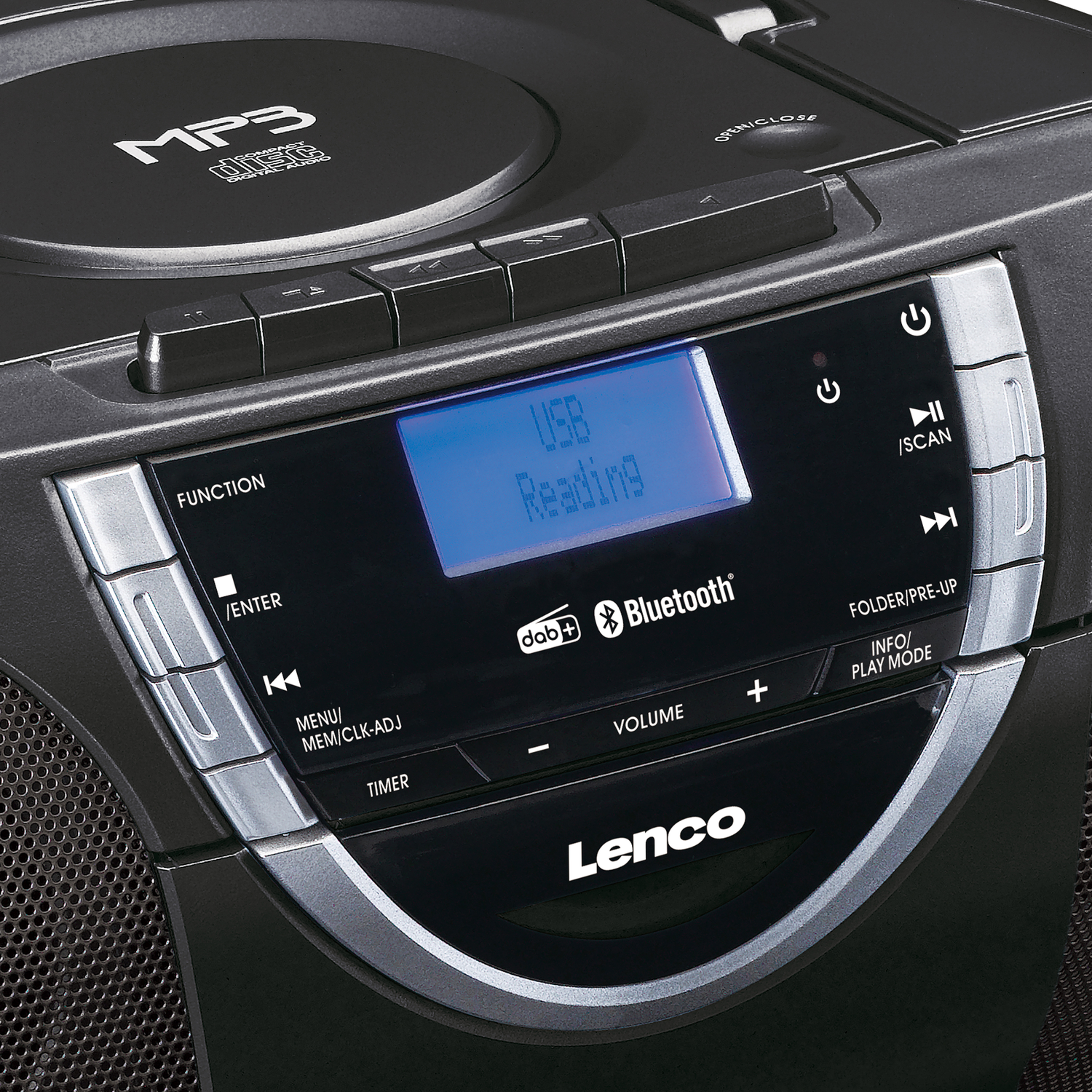 Close-up of a black CD player. Display shows 'USB Reading'. Has buttons and a 'Bluetooth' logo.