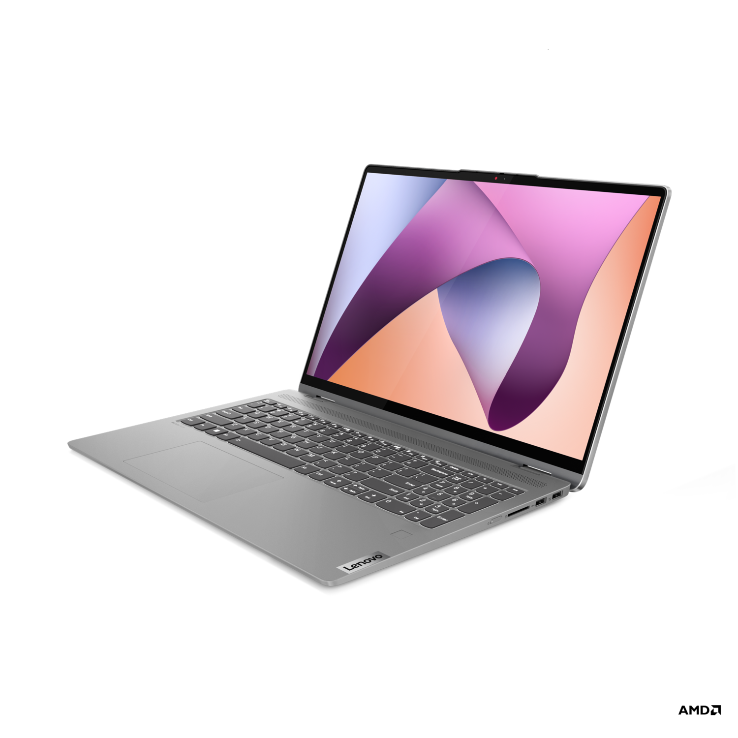 Silver laptop on black. Open, with a colorful screen, Lenovo logo visible.