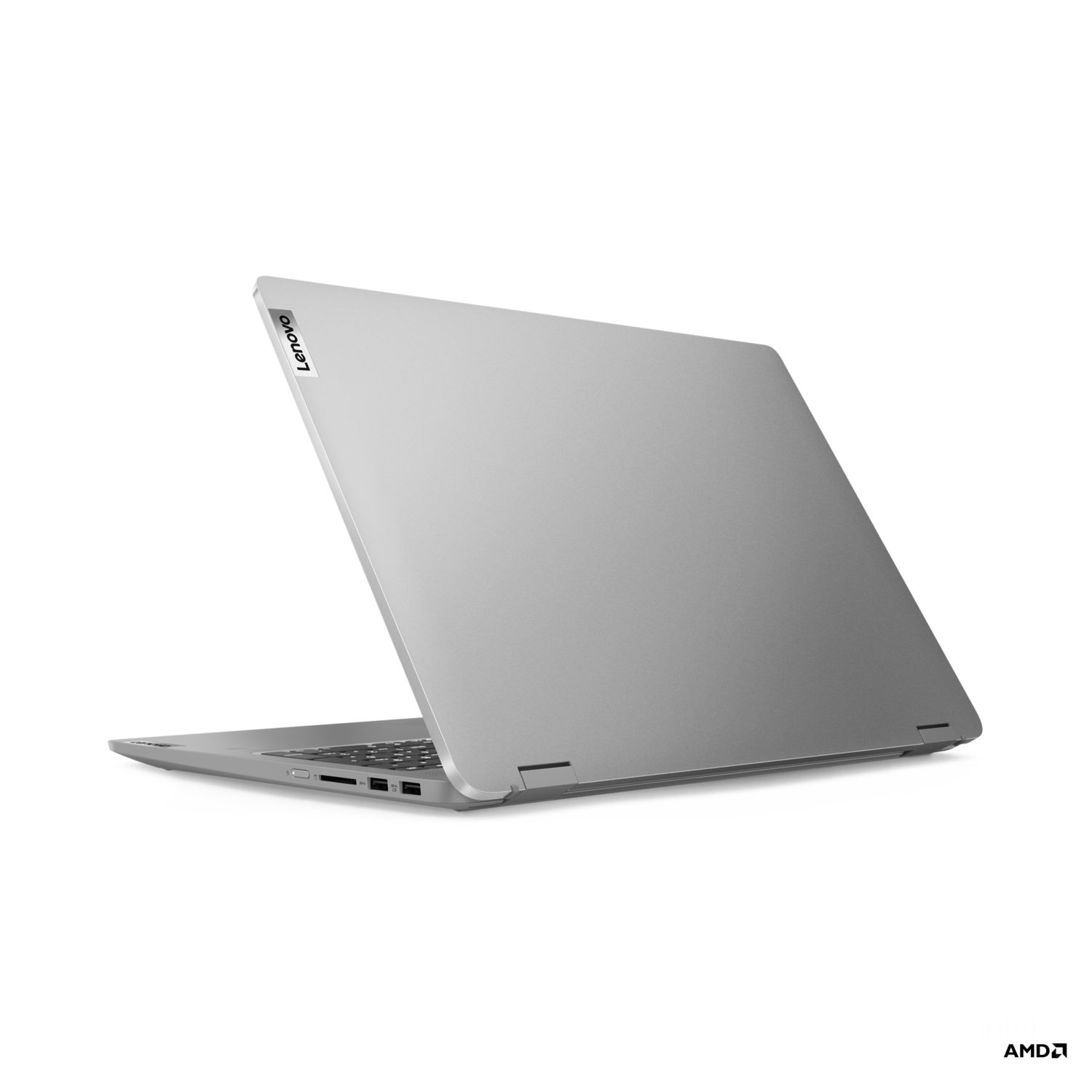Laptop, silver color, open, angled view. Lenovo logo is visible on the top left.