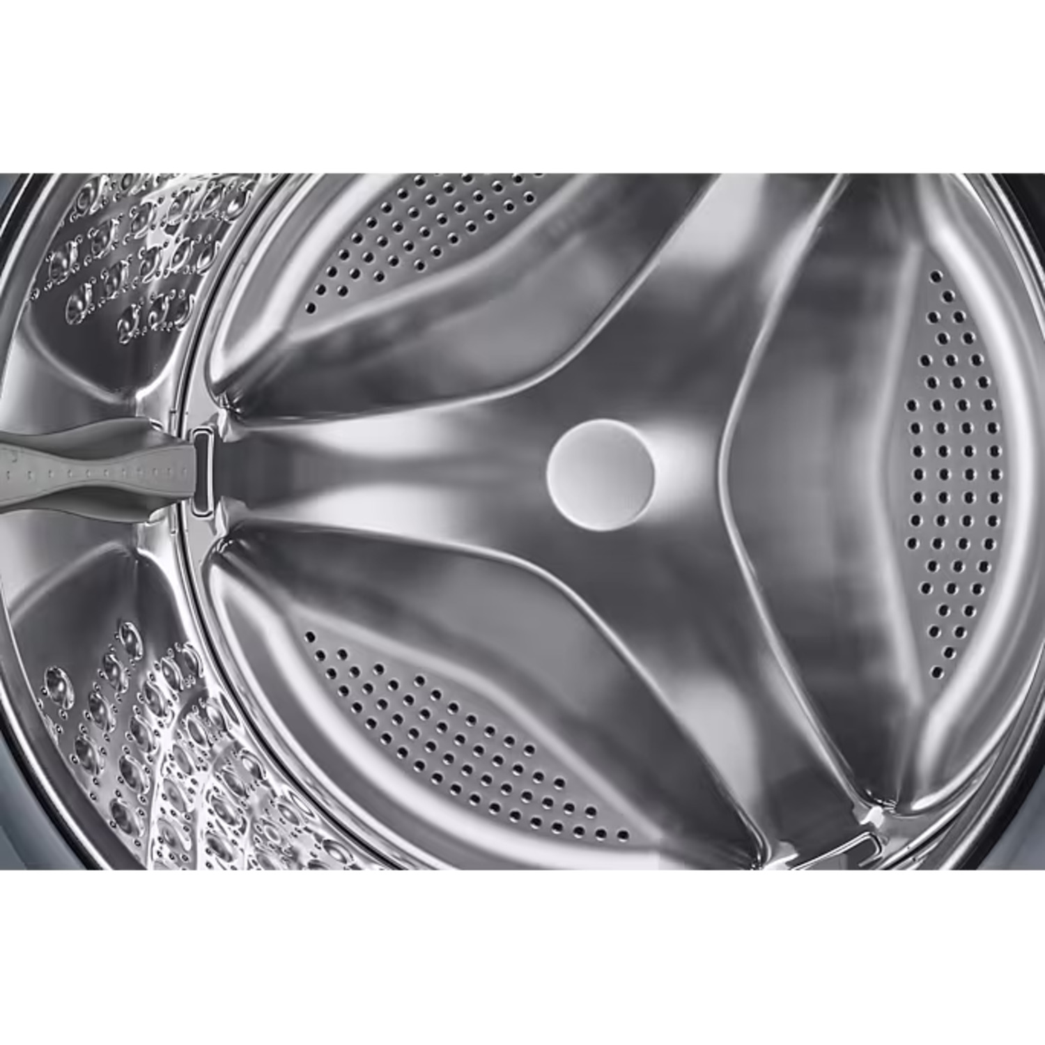 Close-up of a washing machine drum with a metallic interior and holes.