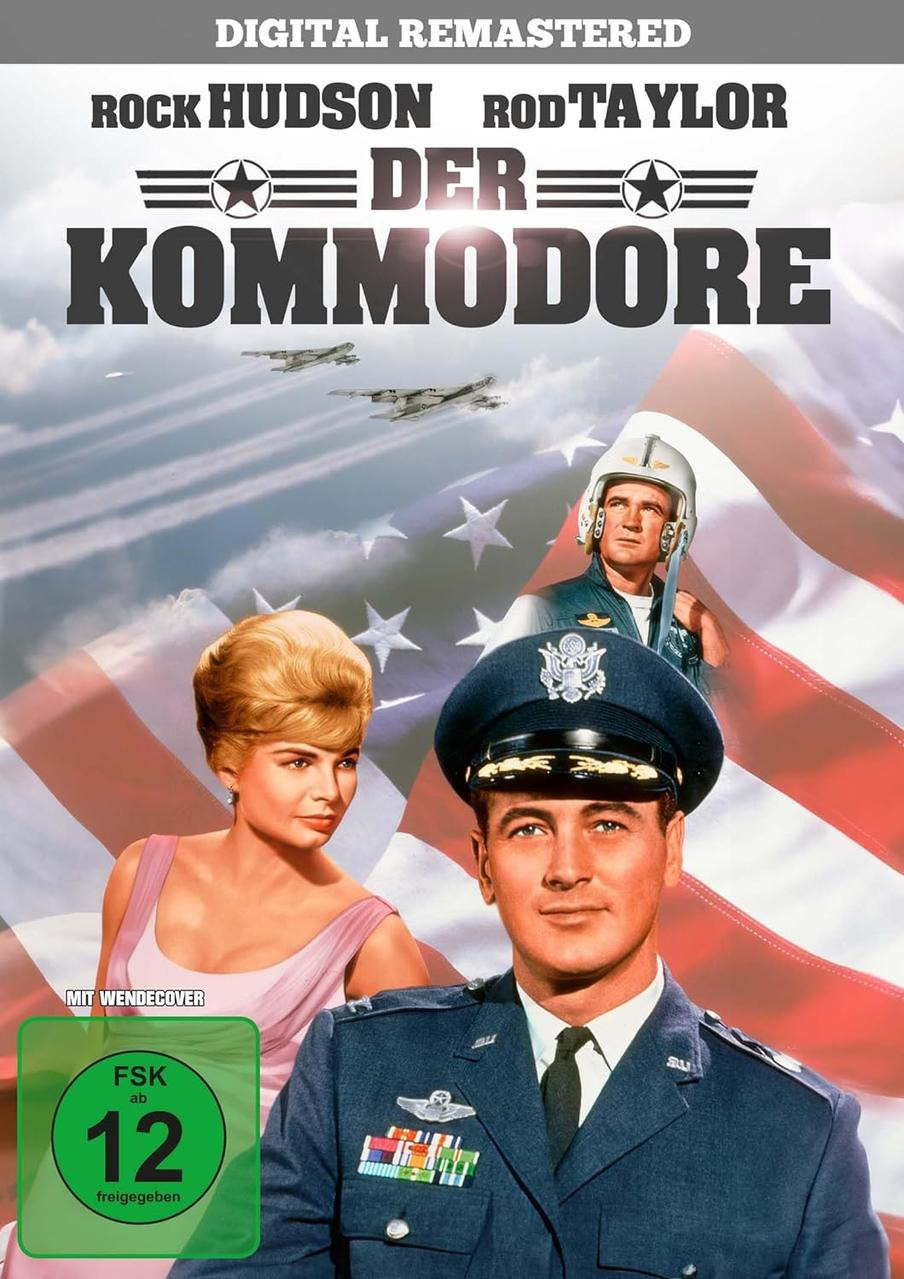 Filmplakat: Der Kommodore. Menschen vor Flagge und Flugzeugen.
