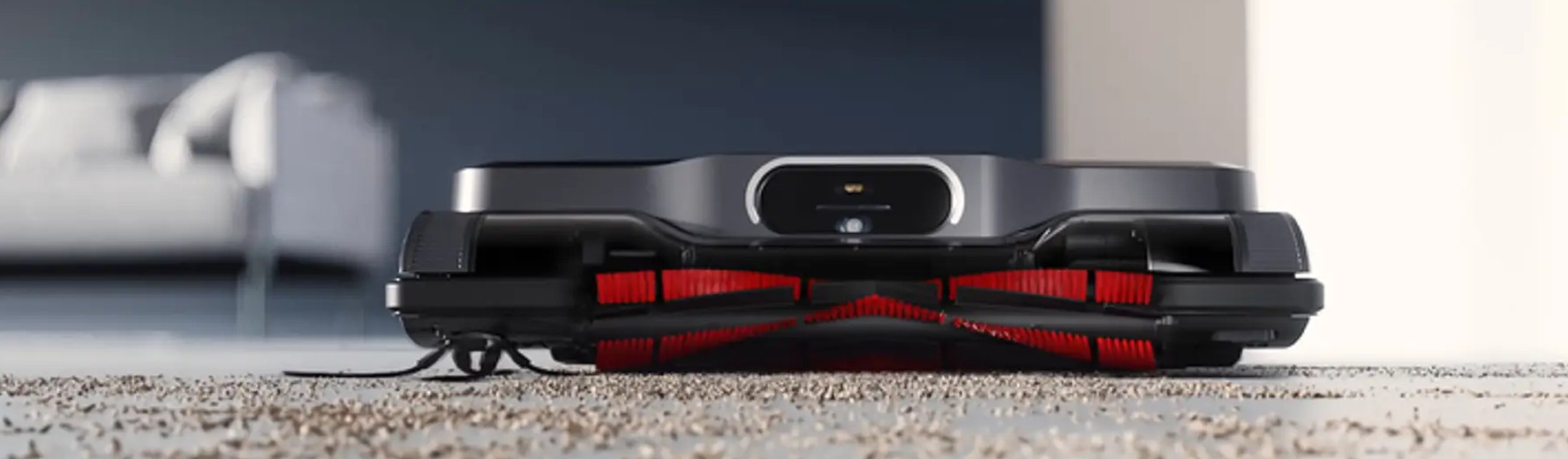 Nowoczesny salon z włączonym telewizorem.