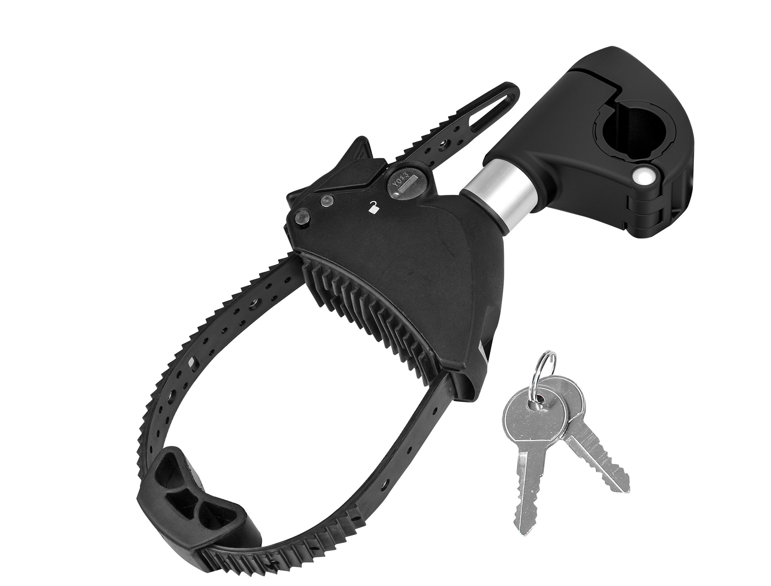 Schwarzes Fahrradträgerteil mit Riemen, Verriegelungsmechanismus und Schlüsseln.