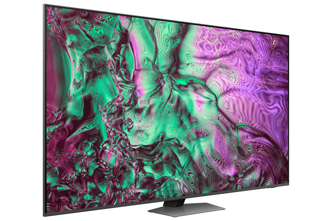 Siyah bir arka plan üzerinde renkli, soyut bir görüntü gösteren büyük bir TV ekranı.