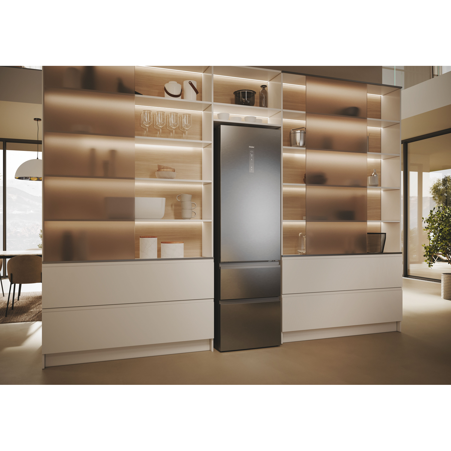 A stainless steel fridge built into a wooden cabinet with lights on.