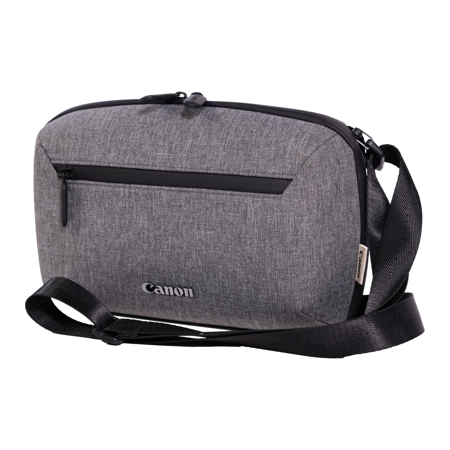 Grijze Canon cameratas met zwarte riem en Canon logo.
