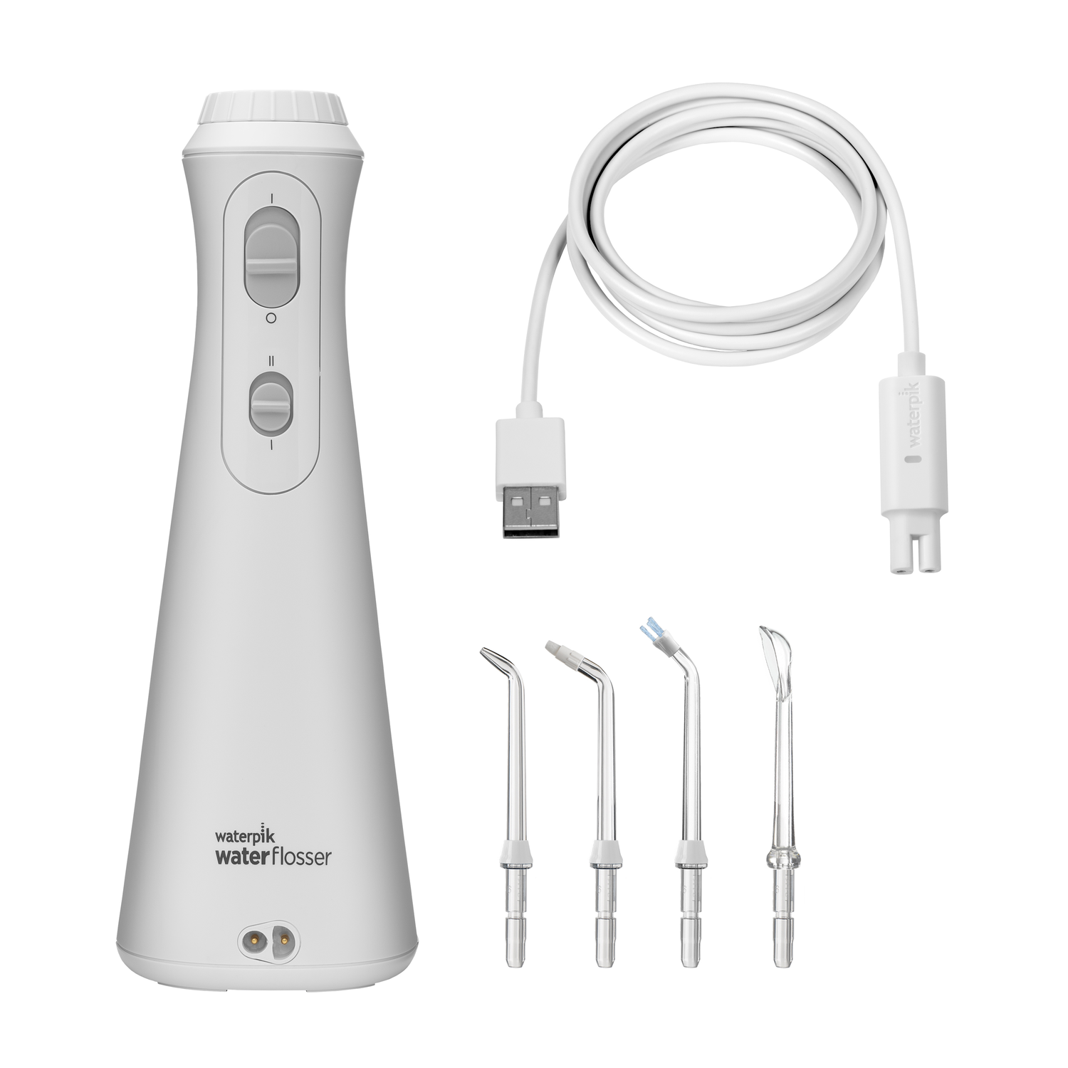 Witte waterflosser met accessoires. Wit apparaat, USB-kabel en flosserkoppen.