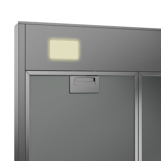 Primer plano de una campana extractora de cocina con una pequeña luz rectangular encendida.