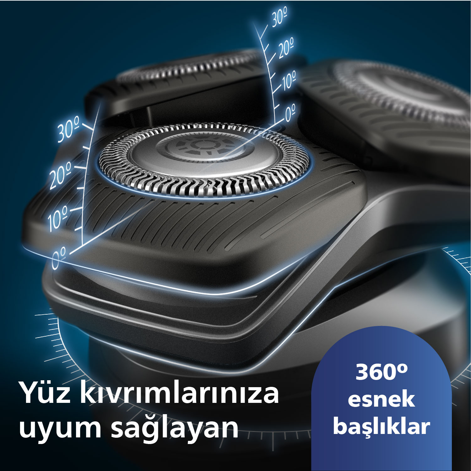Dereceleri işaretlenmiş siyah bir elektrikli tıraş makinesinin yakın çekimi, tıraş başlıklarını gösteriyor.