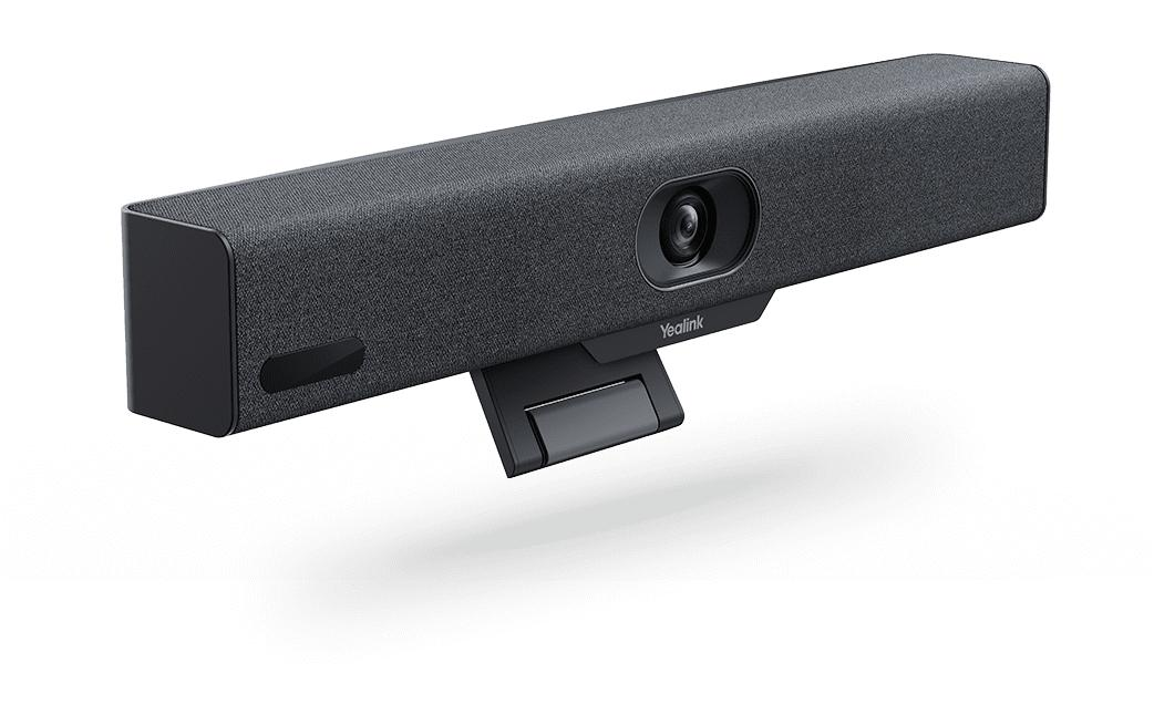 Eine graue Yealink Videokonferenz-Kamera mit integrierter Soundbar und Ständer auf weißem Hintergrund.
