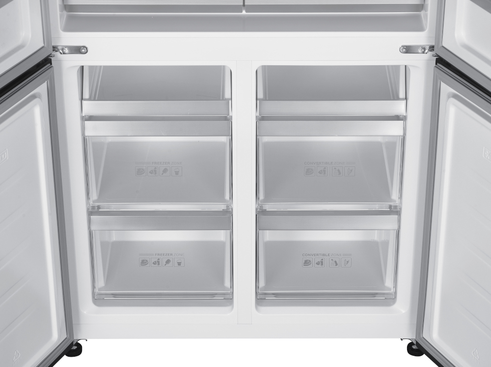 An open refrigerator with four clear drawers.