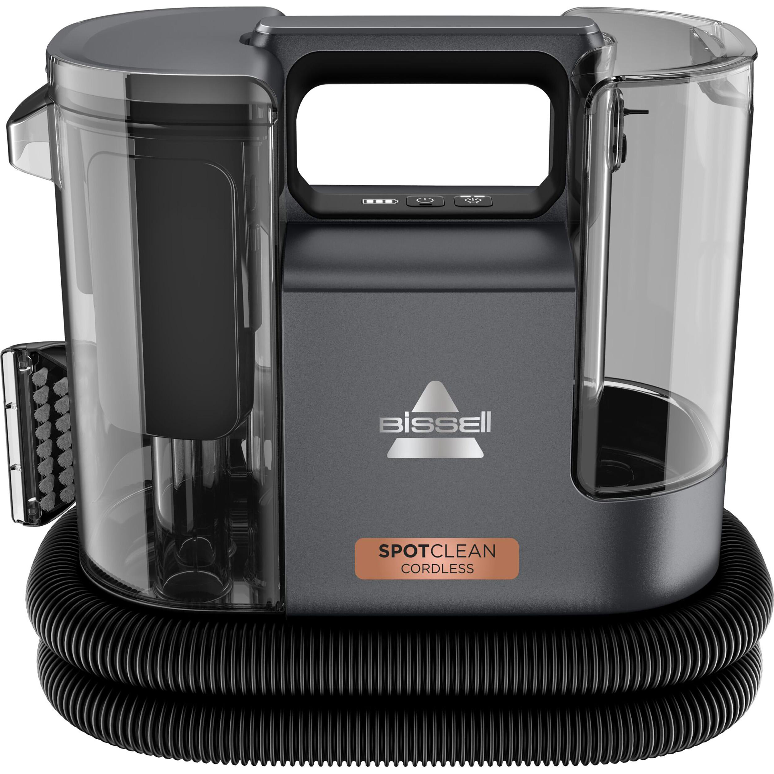 Ein Bissell SpotClean Cordless Reiniger mit Schlauch und kleiner Bürste.