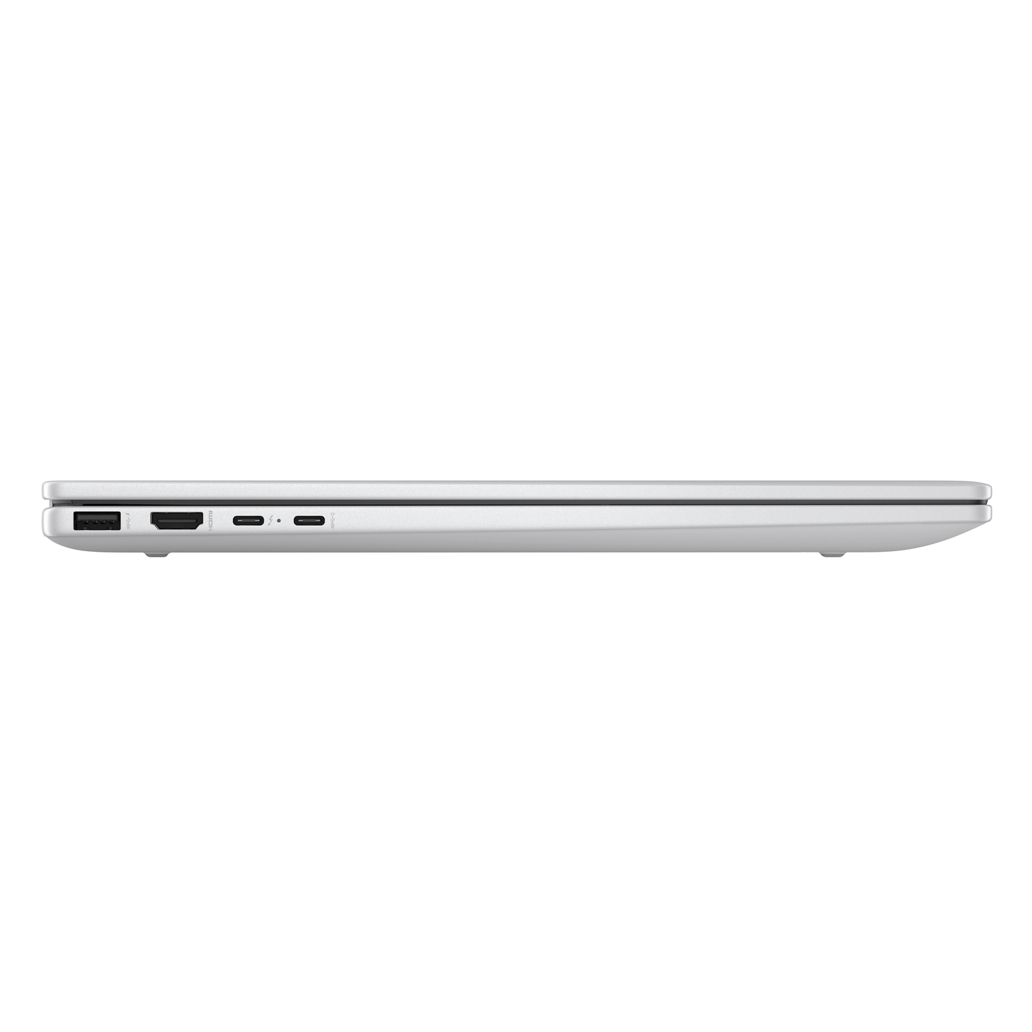 Vue latérale d'un ordinateur portable argenté, montrant les ports USB-C et autres ports.