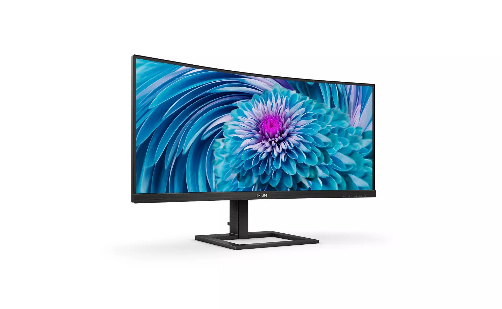 Un monitor de ordenador curvo que muestra una imagen floral.