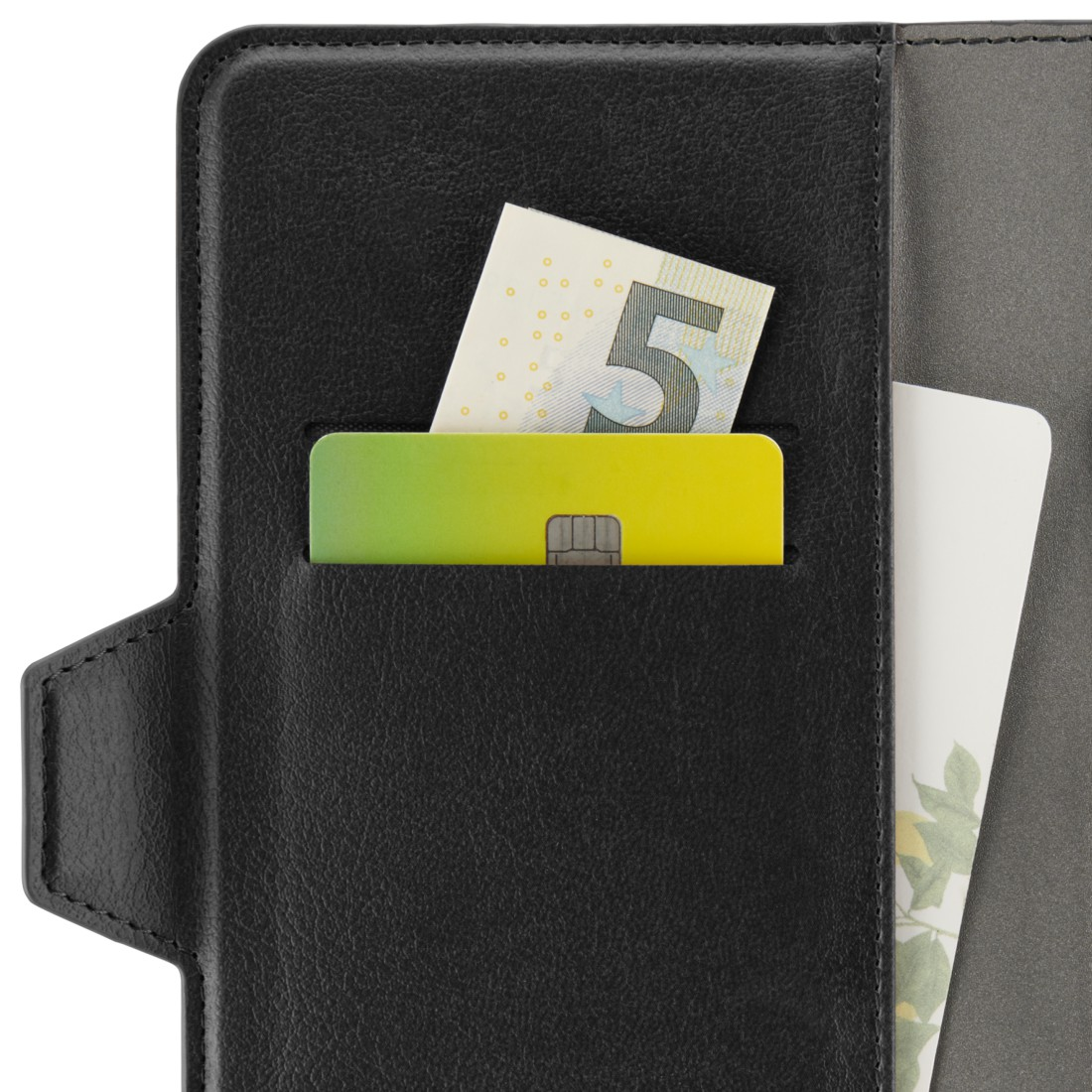 Nahaufnahme einer schwarzen Handyhülle mit Kreditkarte und Geld in der Tasche.