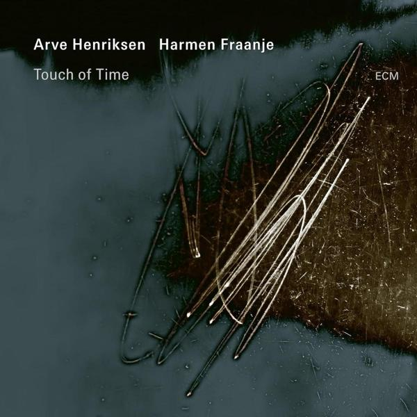 Album borító: absztrakt művészet vonalakkal és sötét háttérrel.