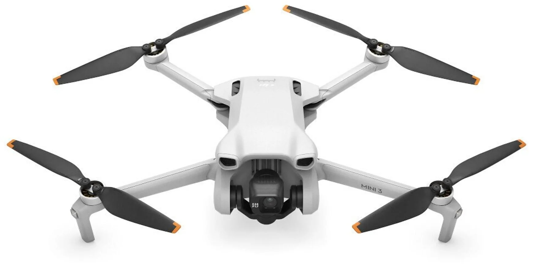 Biały dron z czterema czarnymi śmigłami, kamerą i podwoziem, na białym tle.