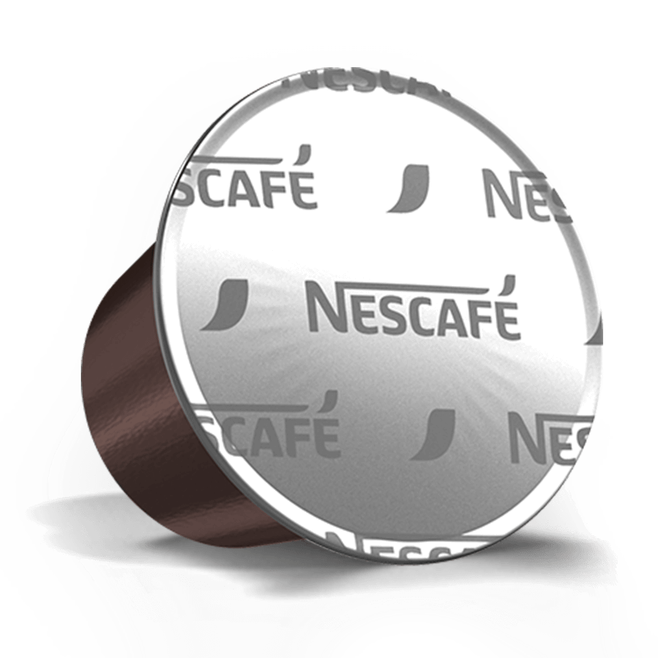 Nescafé kávékapszula, barna és ezüst. Az ezüstön a Nescafé logó látható.