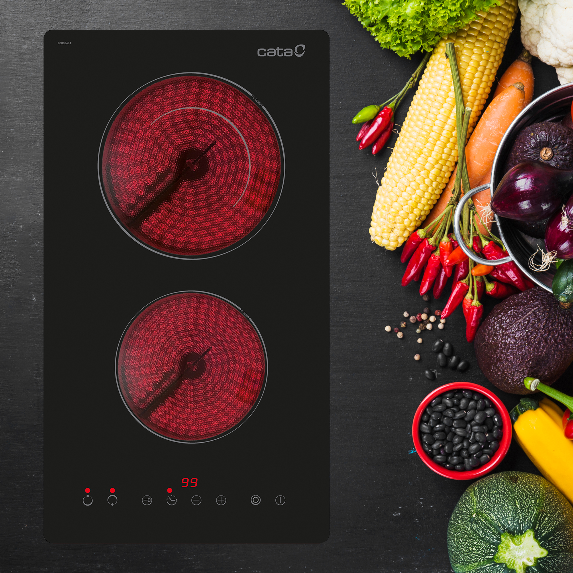 Placa de cocina negra con elementos calefactores rojos y verduras. Se ven maíz y pimientos.